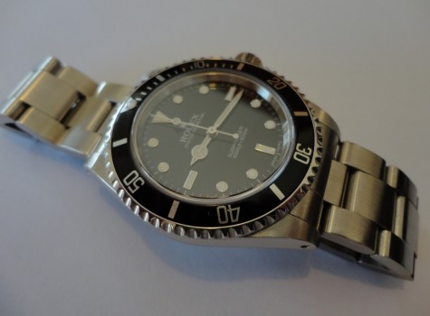 14060M Rolex Submariner overhaul and insurance valuation